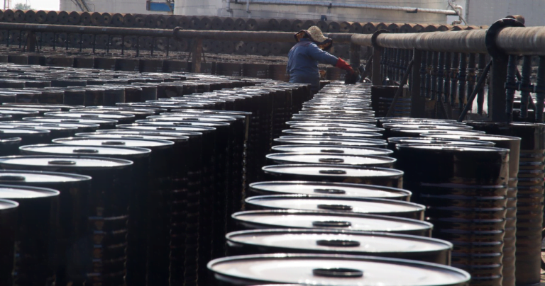 Bitumen drums being prepared for transport